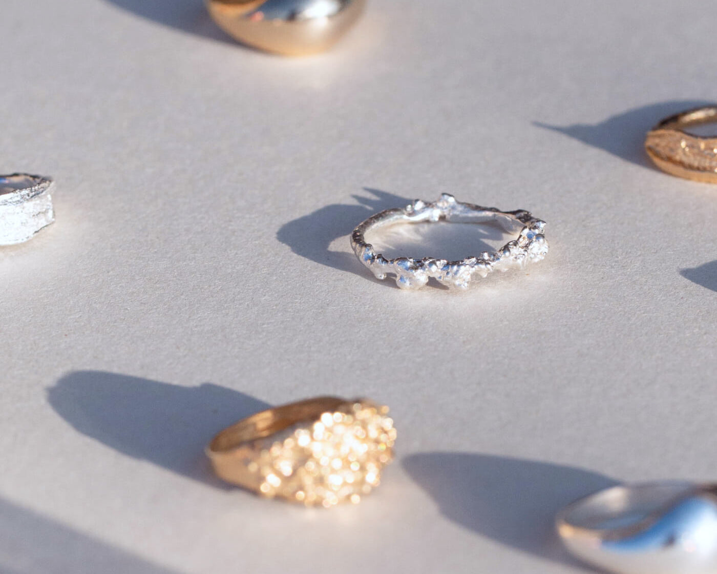 Collection of various rings on a light surface